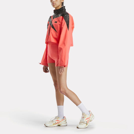 Reebok Apparel Women Reebok x Angel Reese Vector Track Jacket SUNSET CORAL