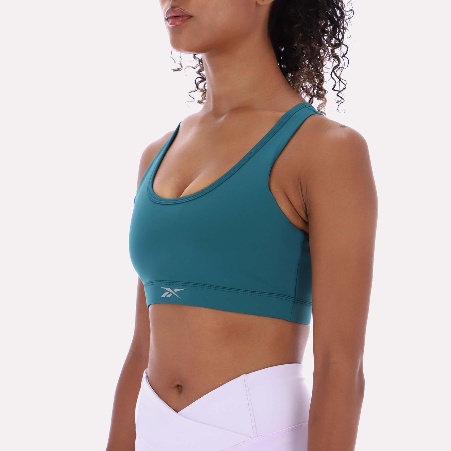 Reebok Apparel Women RBK-DRY Motion Sports Bra RETRO TEAL