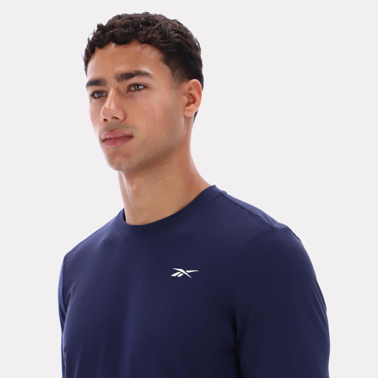 Reebok Apparel Men Core Move T-Shirt VECTOR NAVY