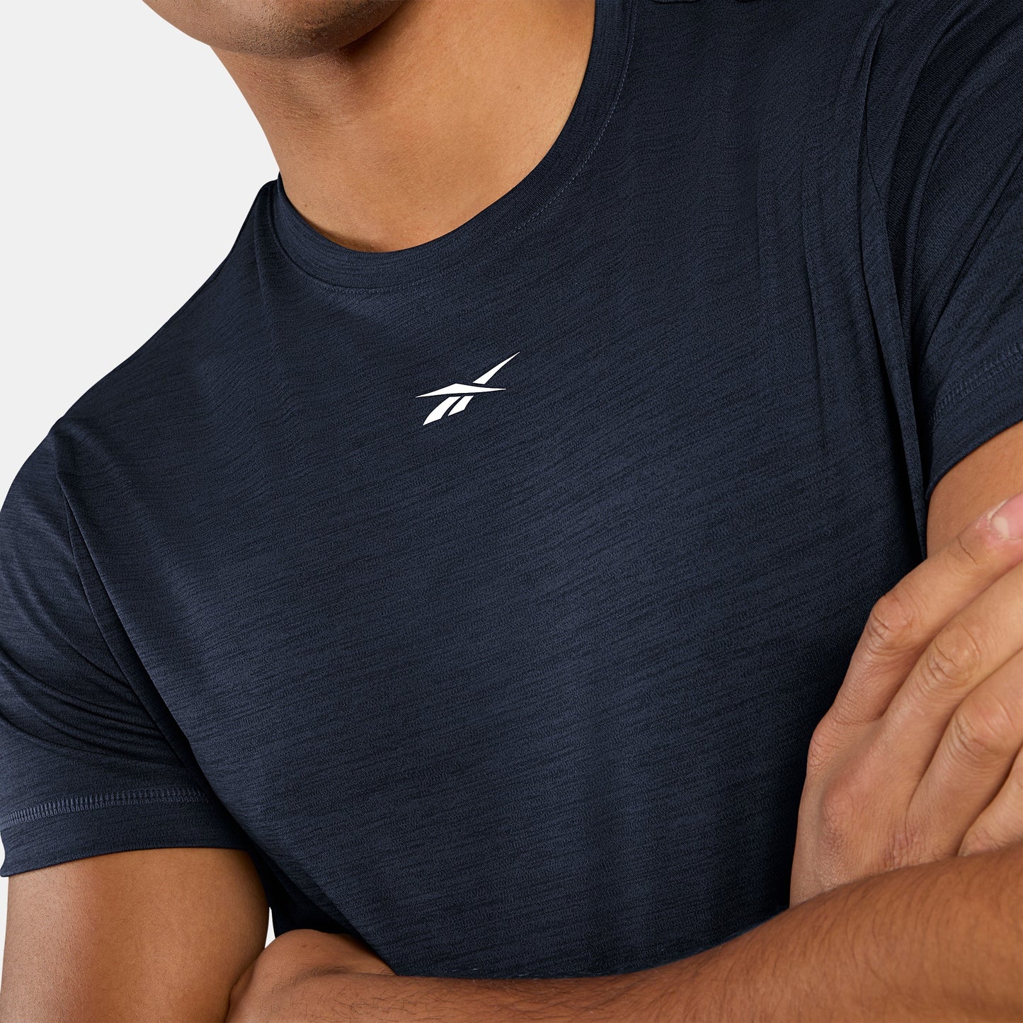 REEBOK APPAREL MEN ID TRAIN MELANGE TECH TEE MEN VECTOR NAVY