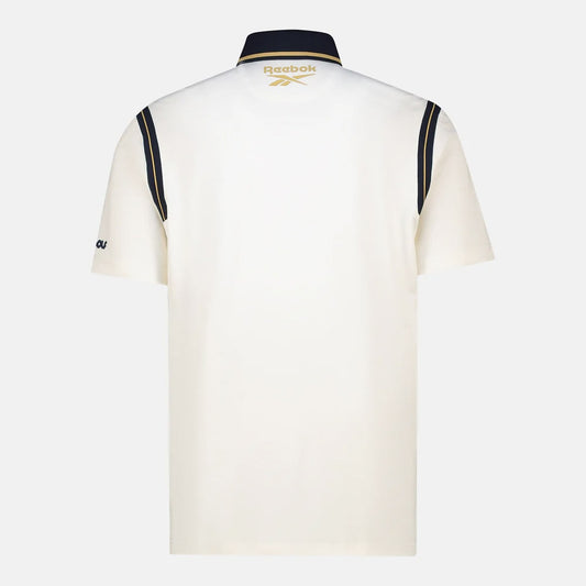 REEBOK APPAREL MEN Crushers GC Varsity Short Sleeve Polo CHALK/GOLD/VECTOR NAVY
