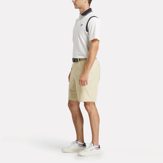 REEBOK APPAREL MEN Varsity Golf Short Sleeve Polo CHALK/GOLD/VECTOR NAVY