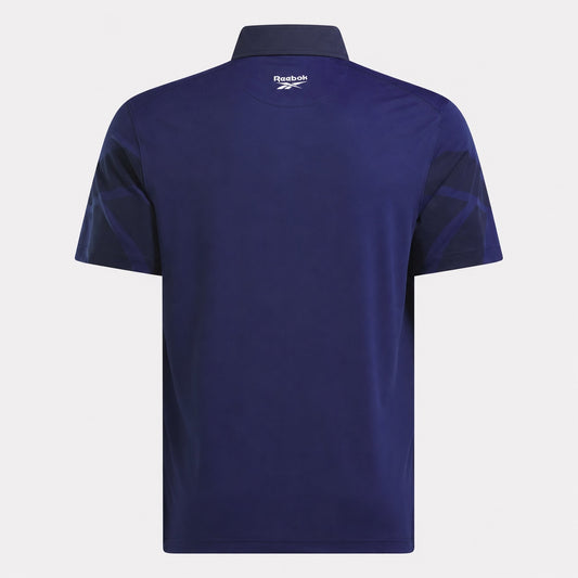 REEBOK APPAREL MEN Golf Signature Vector Colorblocked Polo Shirt MIDNIGHT BLUE/VECTOR NAVY