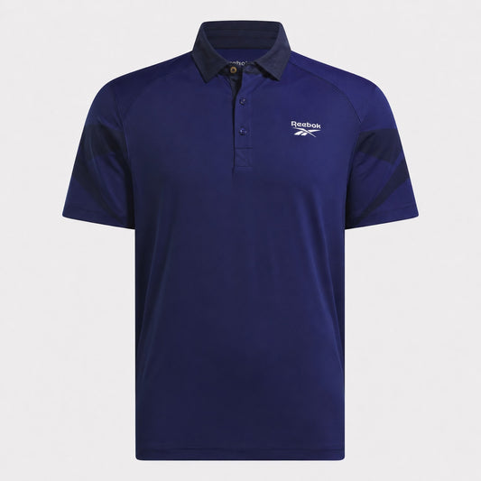 REEBOK APPAREL MEN Golf Signature Vector Colorblocked Polo Shirt MIDNIGHT BLUE/VECTOR NAVY