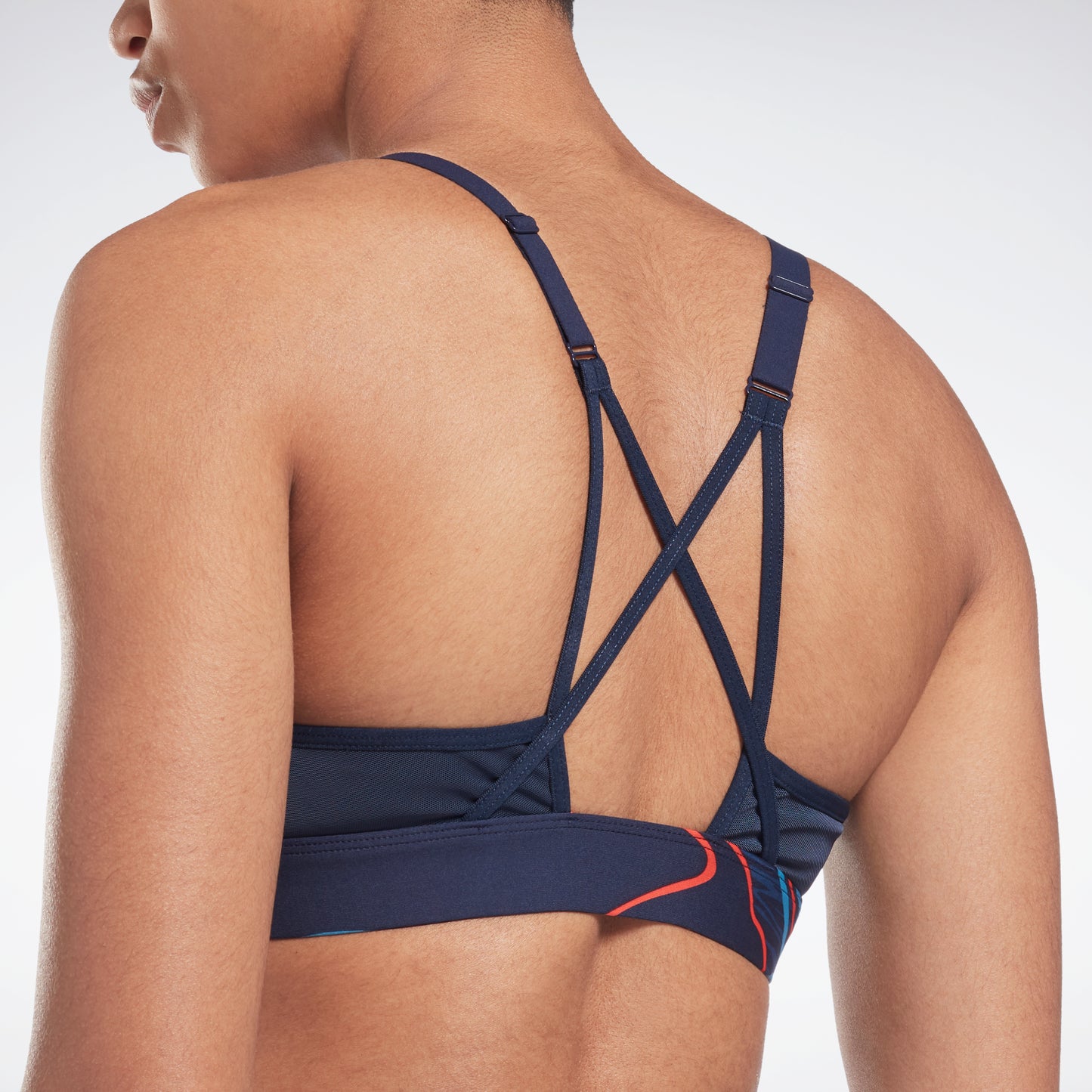 Reebok Apparel Women Lux Strappy Sports Bra Nature Grown Print Vecnav