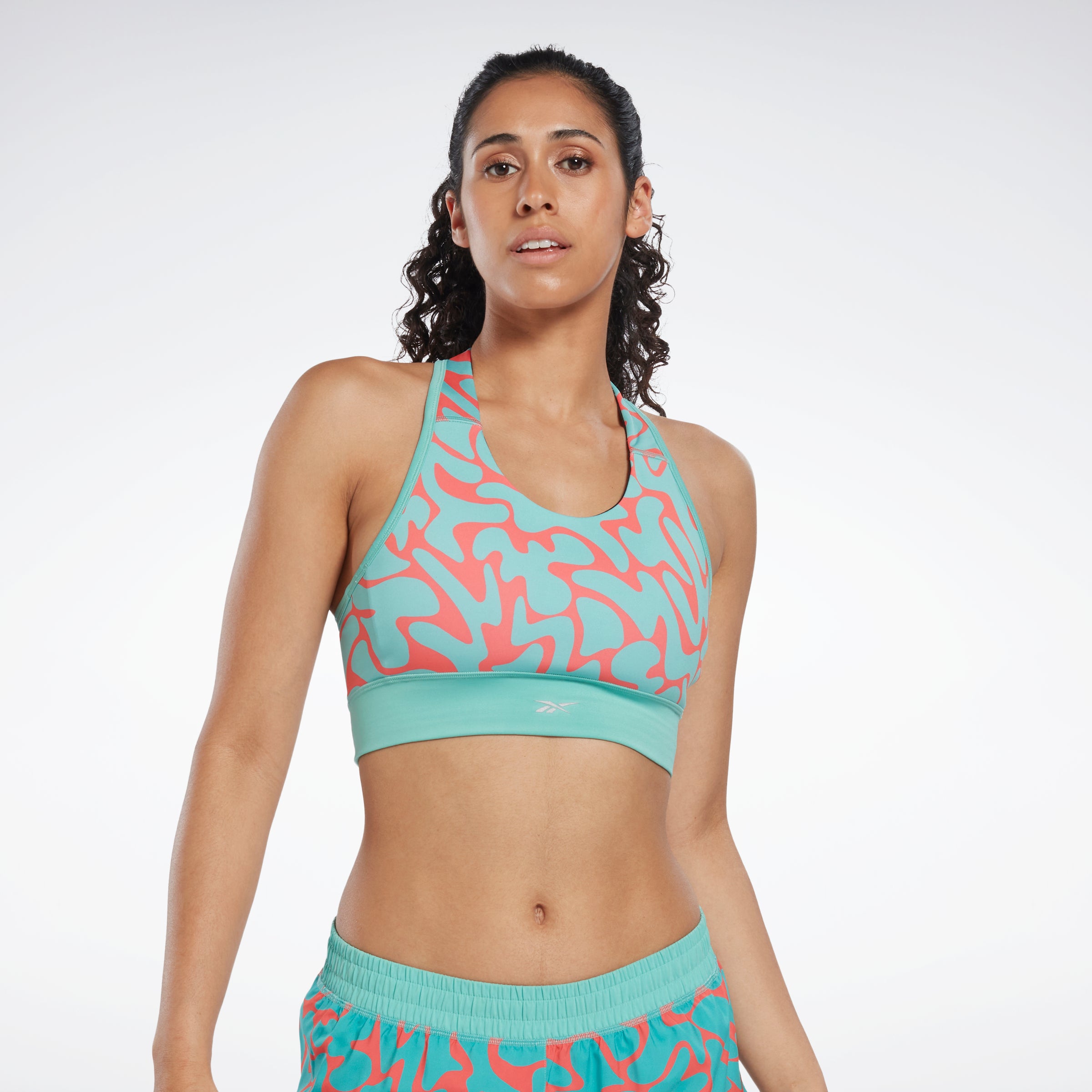 Printed sports bra in multicoloured - The Upside
