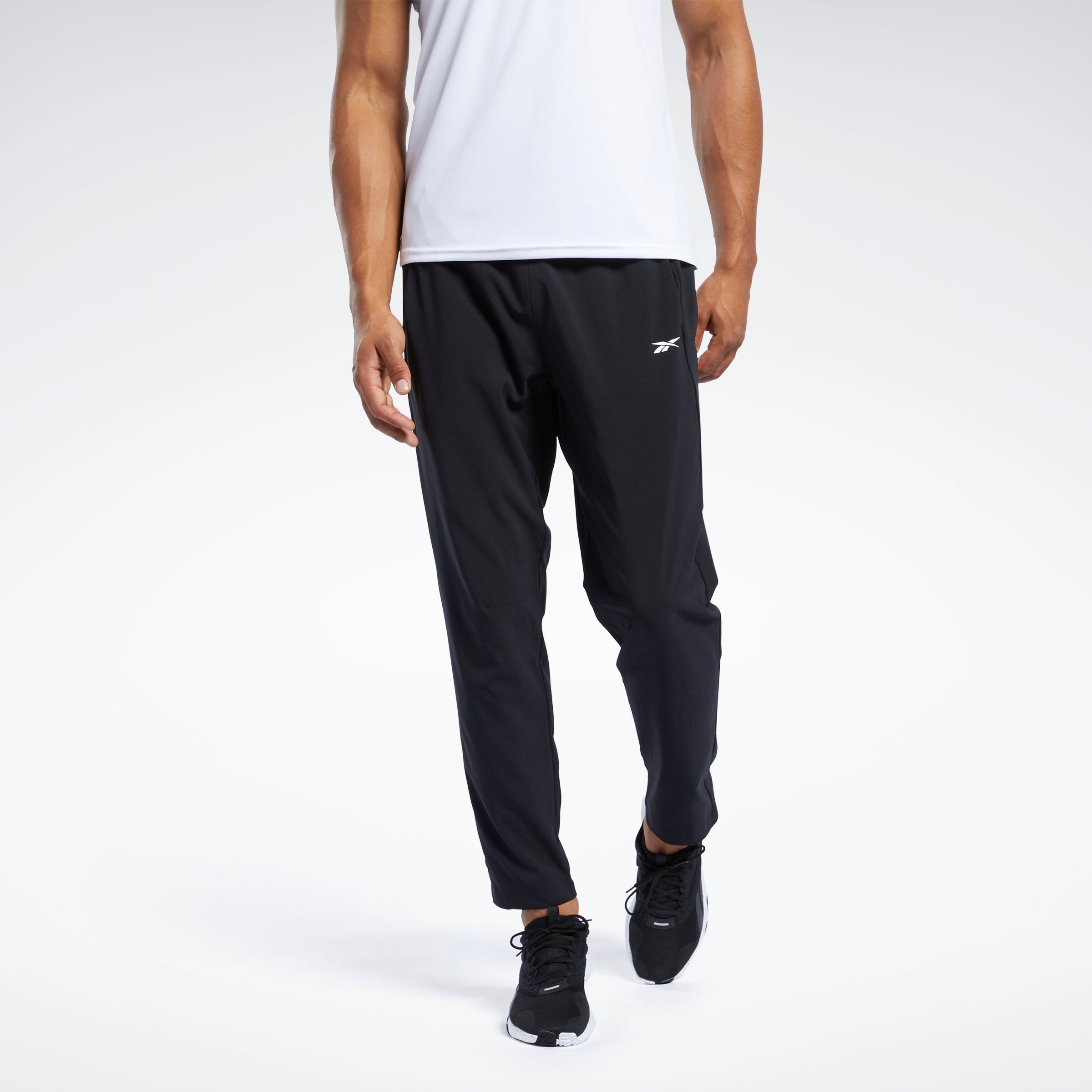 Reebok Training woven tech sweatpants in black - ShopStyle Activewear Pants