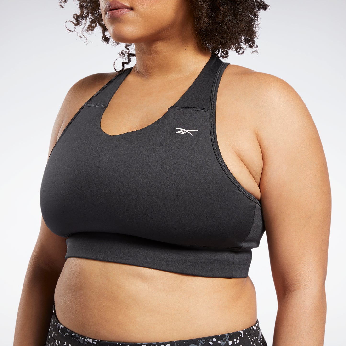 Reebok Apparel Women Running Essentials Sports Bra (Plus Size) Nghblk