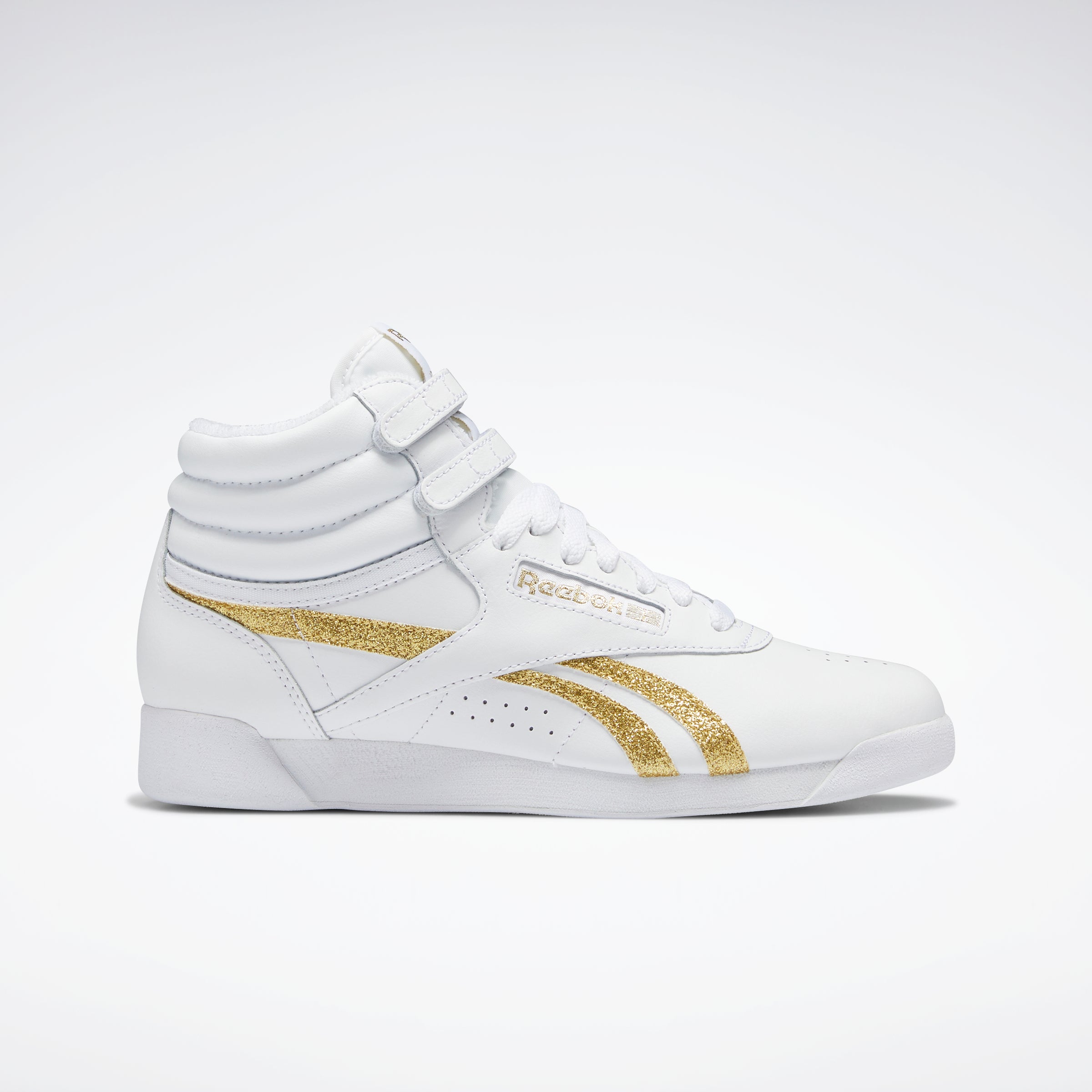 reebok freestyle hi mens gold