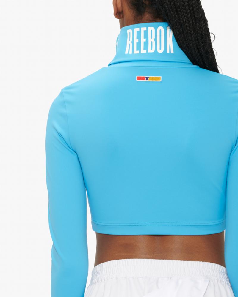 Reebok Apparel Women PYER MOSS TURTLE NECK ALWBLU