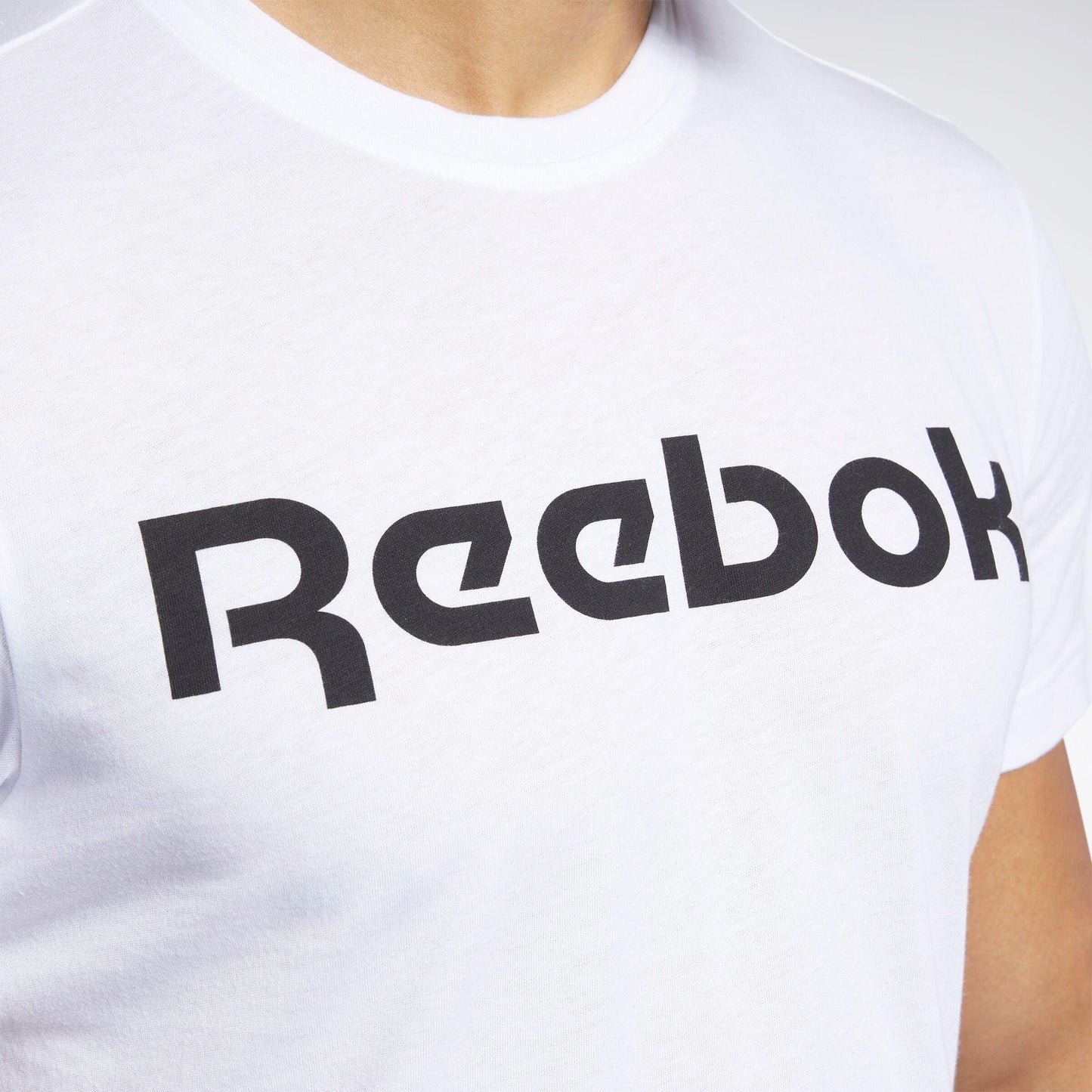 Reebok Apparel Men Graphic Series Linear Logo T-Shirt WHITE