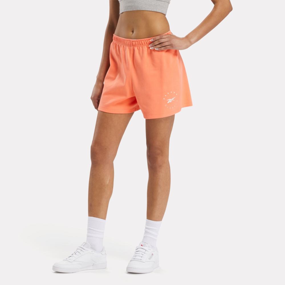 Reebok Apparel Women ID Energy Shorts SUPERCHARGED CORAL