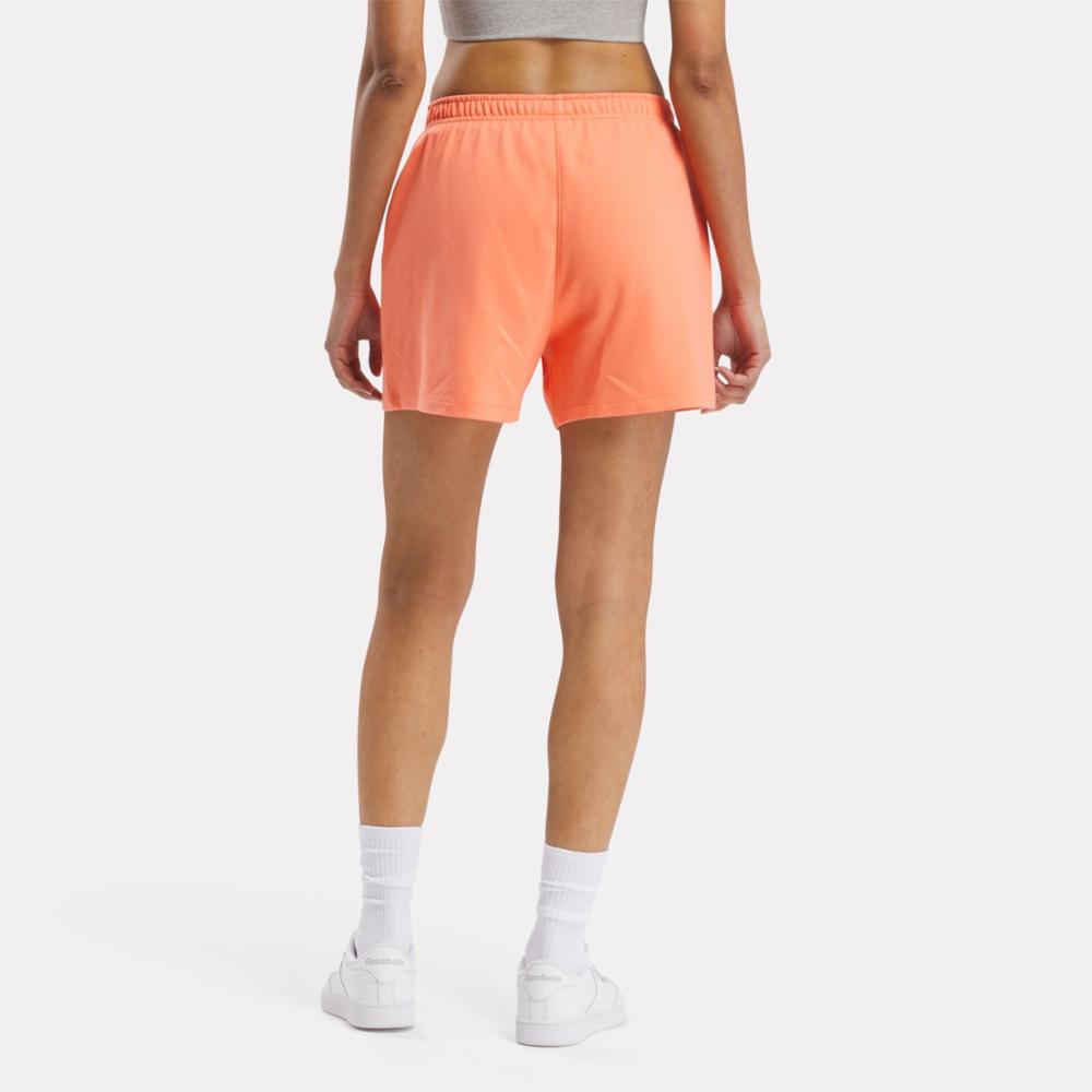 Reebok Apparel Women ID Energy Shorts SUPERCHARGED CORAL