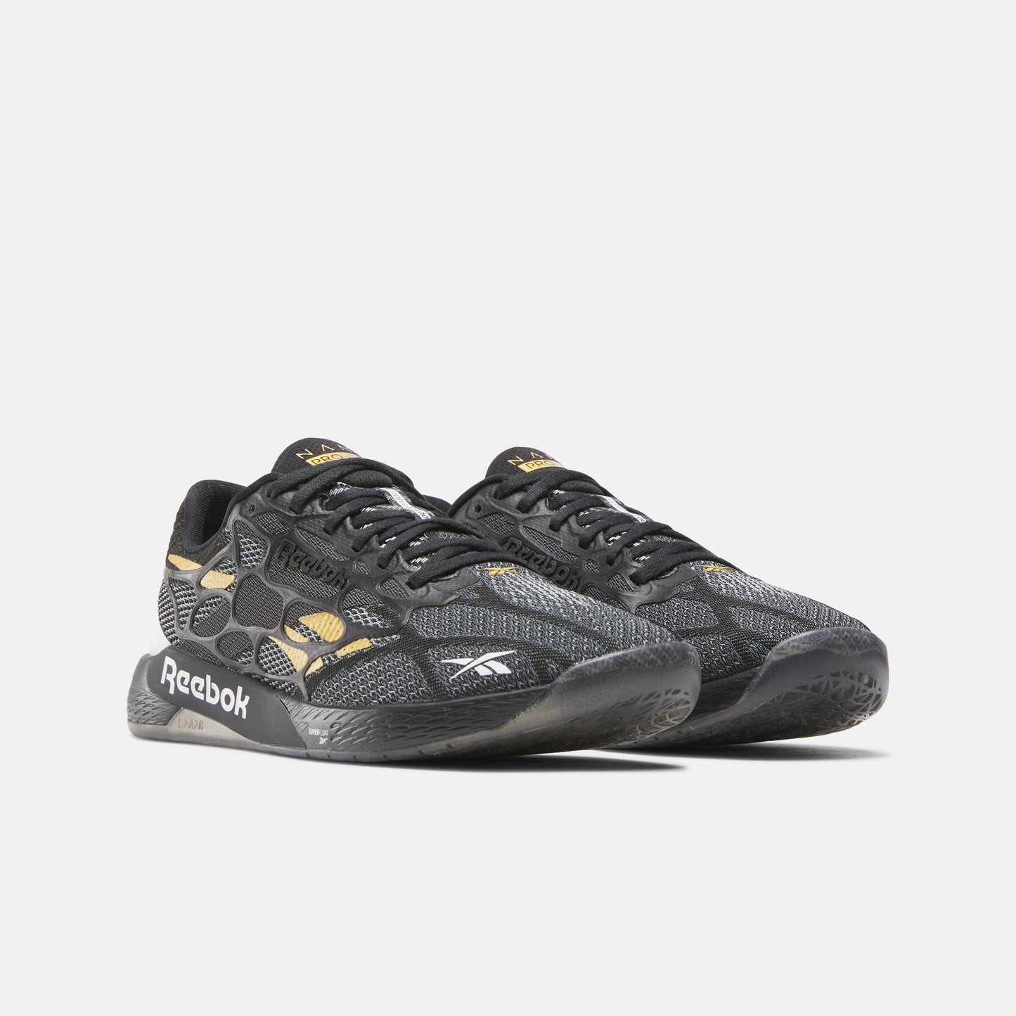 REEBOK FOOTWEAR UNISEX Nano Pro Training Shoes BLACK/FTWR WHITE/GRIT GOLD