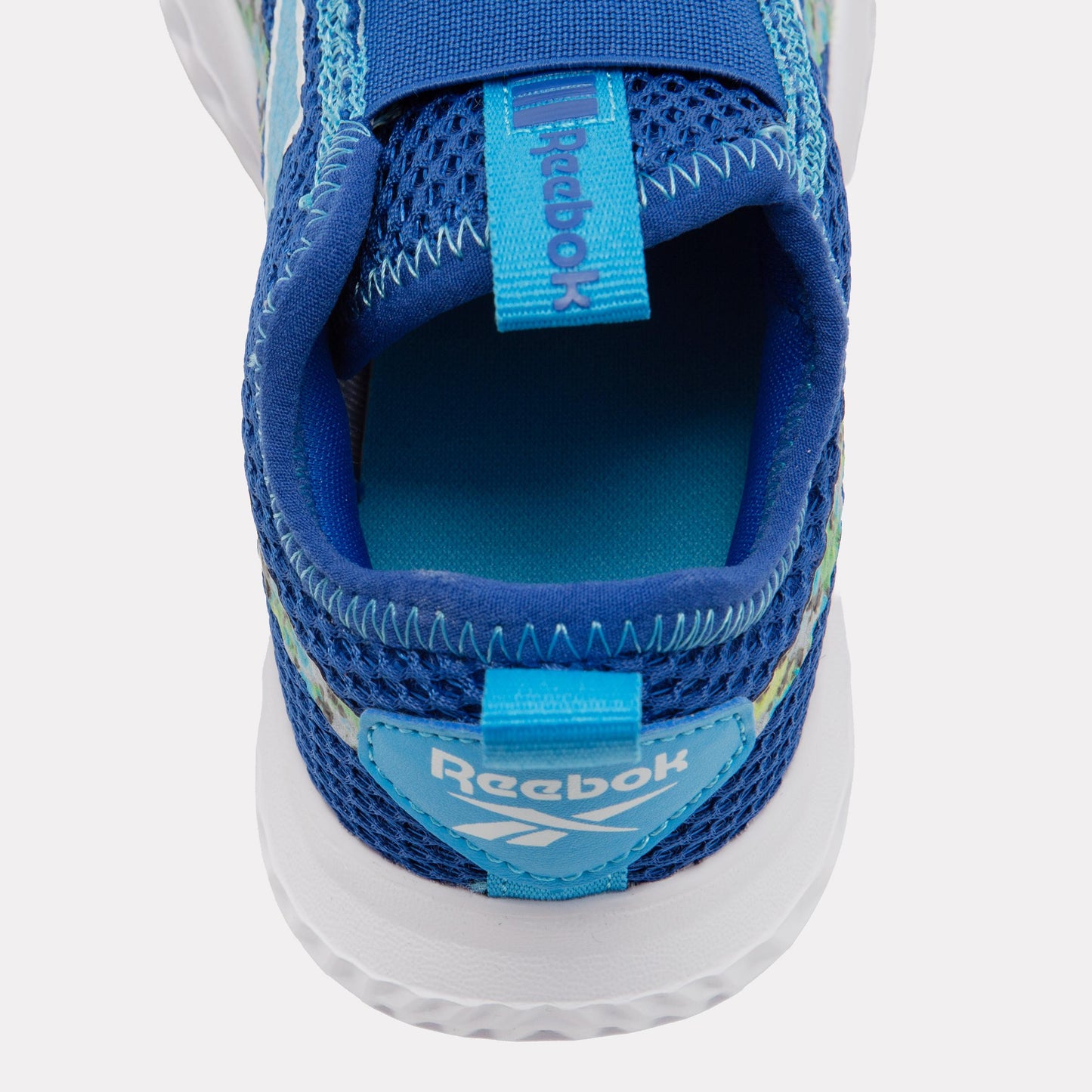 Reebok Footwear Kids Rush Runner Slip-On Shoes – Pre-School VECTORBLUE/FUTURECYAN/FTWRWHIT