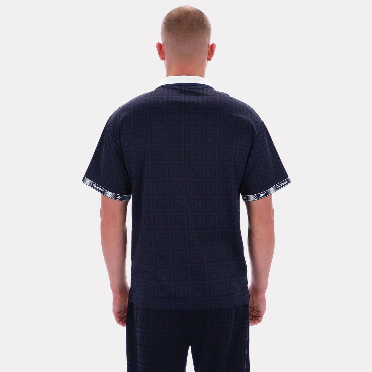 Reebok Apparel Men Reebok Monogram Graphic Jersey VECTOR NAVY AOP