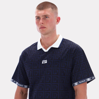 Reebok Apparel Men Reebok Monogram Graphic Jersey VECTOR NAVY AOP