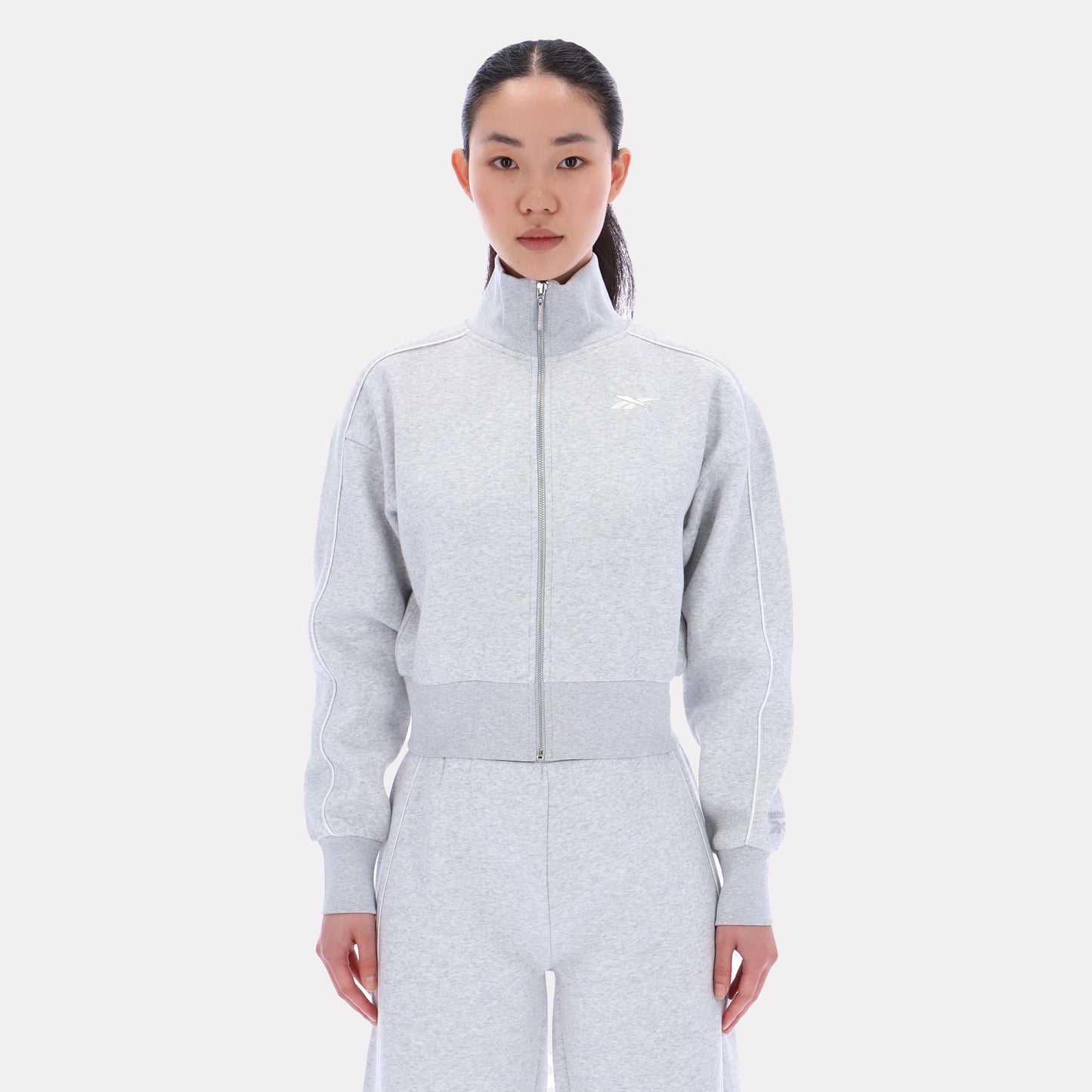 Reebok Apparel Women Off-Duty Cropped Jacket SILVER MARL