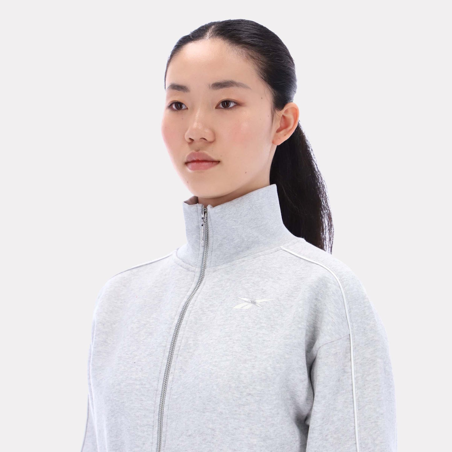 Reebok Apparel Women Off-Duty Cropped Jacket SILVER MARL