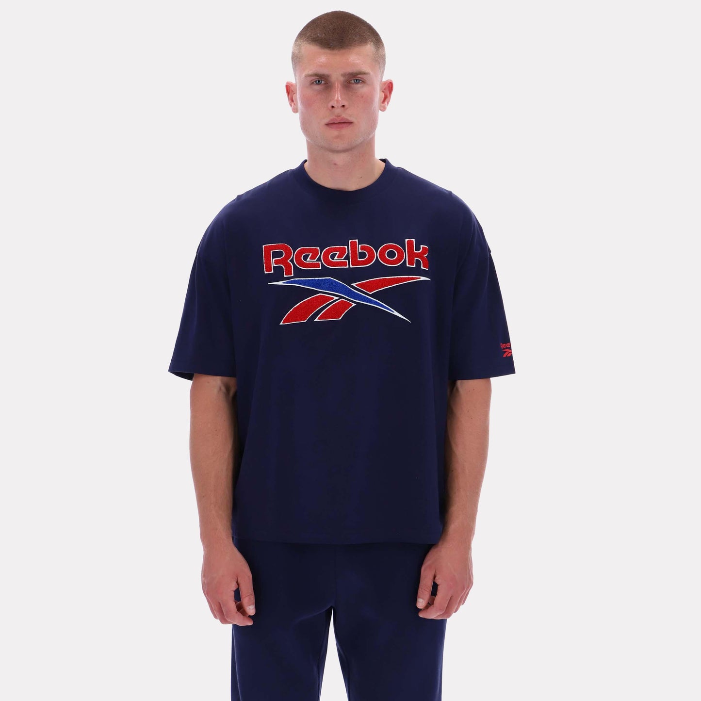 Reebok Apparel Men Reebok Varsity Graphic T-Shirt VECTOR NAVY