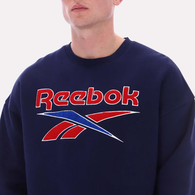 Reebok Apparel Men Varsity Graphic Sweatshirt VECTOR NAVY