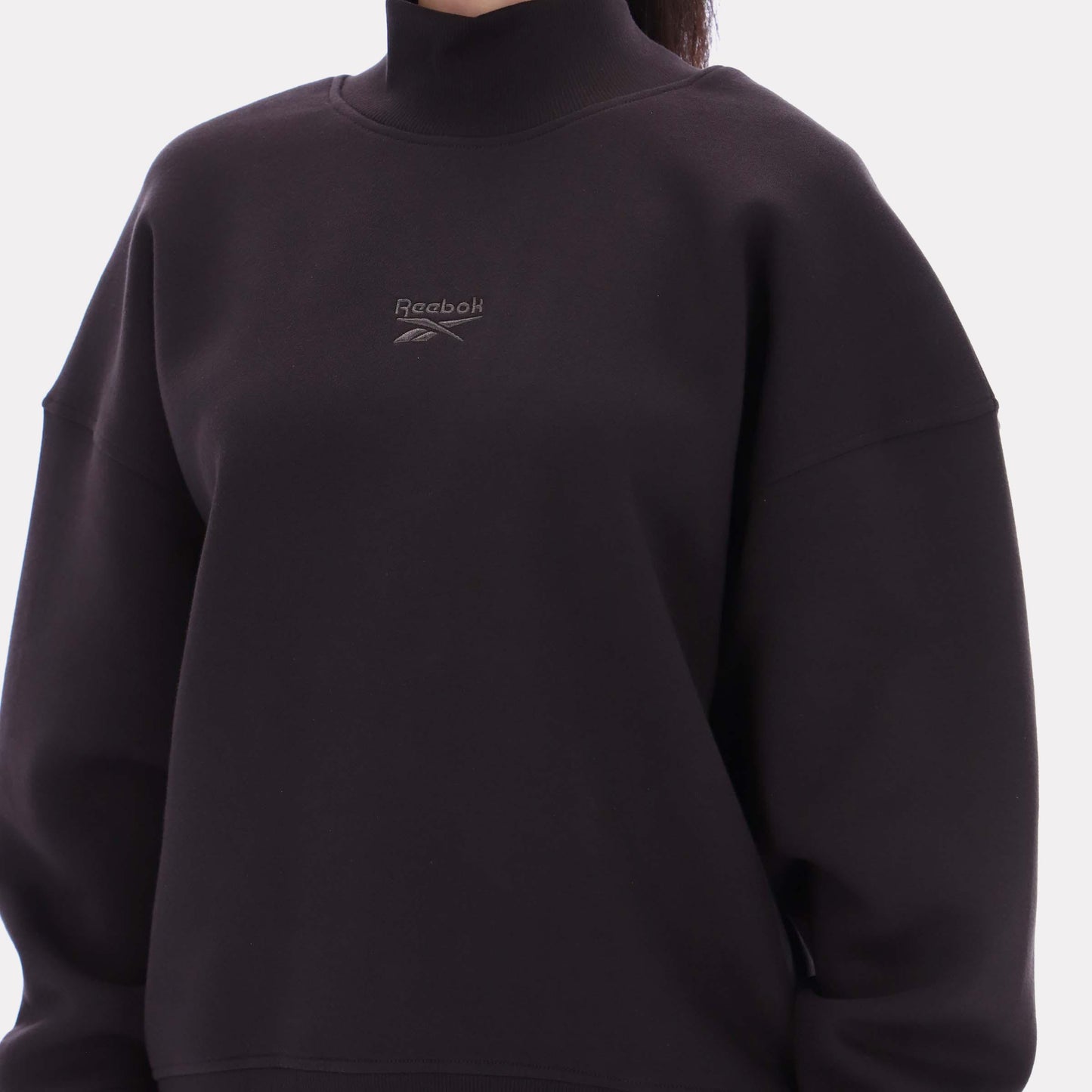 Reebok Apparel Women Longline Roll Neck Sweatshirt WASHED BLACK