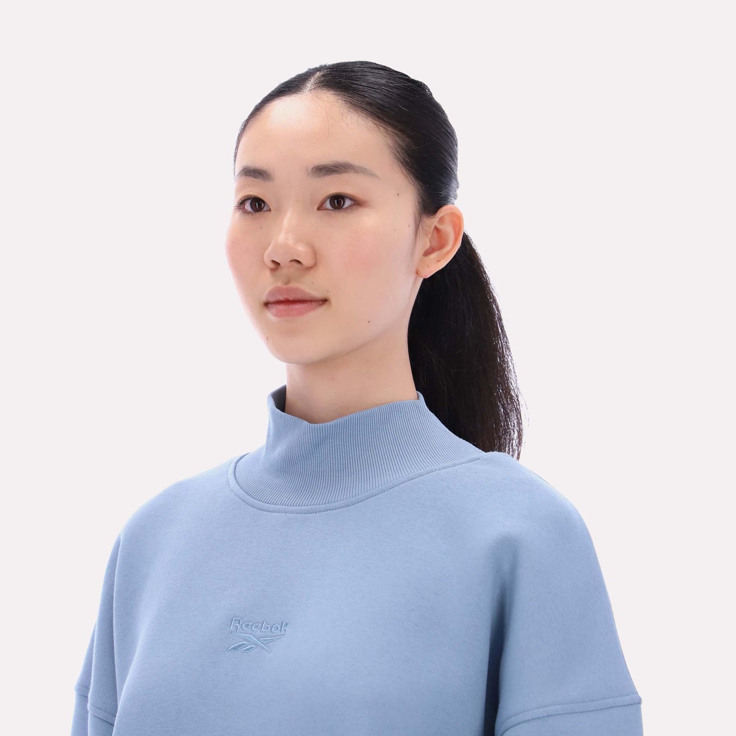 Reebok Apparel Women Oversized Roll Neck Sweatshirt LEISURE BLUE