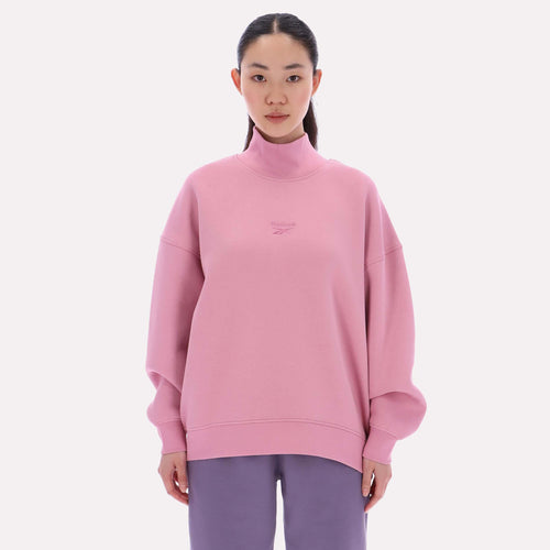 Reebok Apparel Women  Longline Roll Neck Sweatshirt DUSTY ROSE