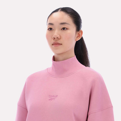 Reebok Apparel Women  Longline Roll Neck Sweatshirt DUSTY ROSE