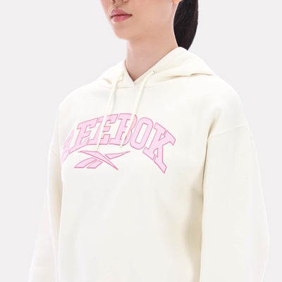 Reebok Apparel Women Varsity Logo Cropped Graphic Hoodie VINTAGE CHALK