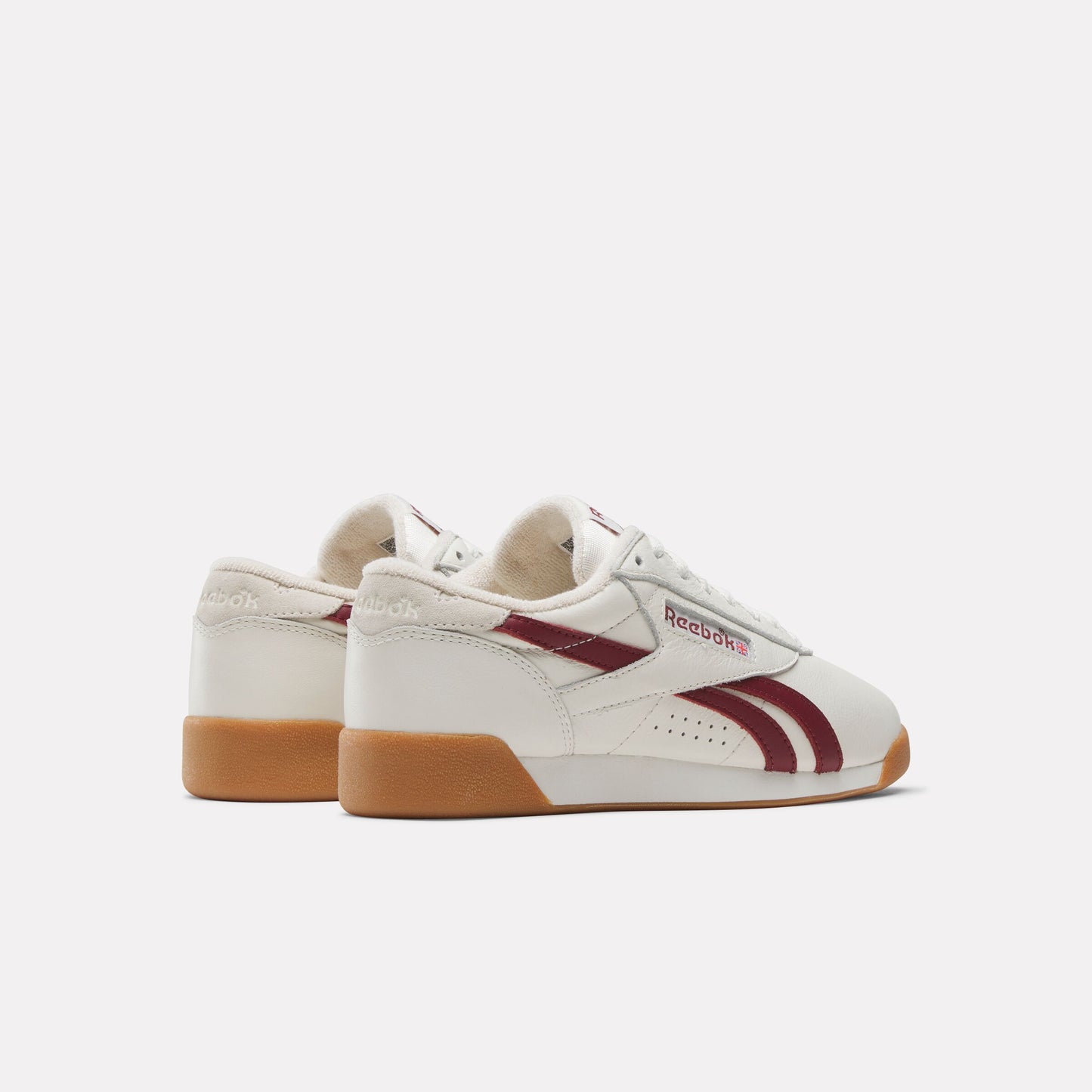 REEBOK FOOTWEAR WOMEN Freestyle Lo Shoes CHALK/CLASSICBURGUNDY/GUM