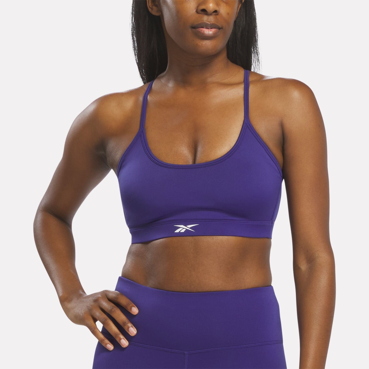 REEBOK APPAREL WOMEN Strappy Sports Bra BOLD PURPLE