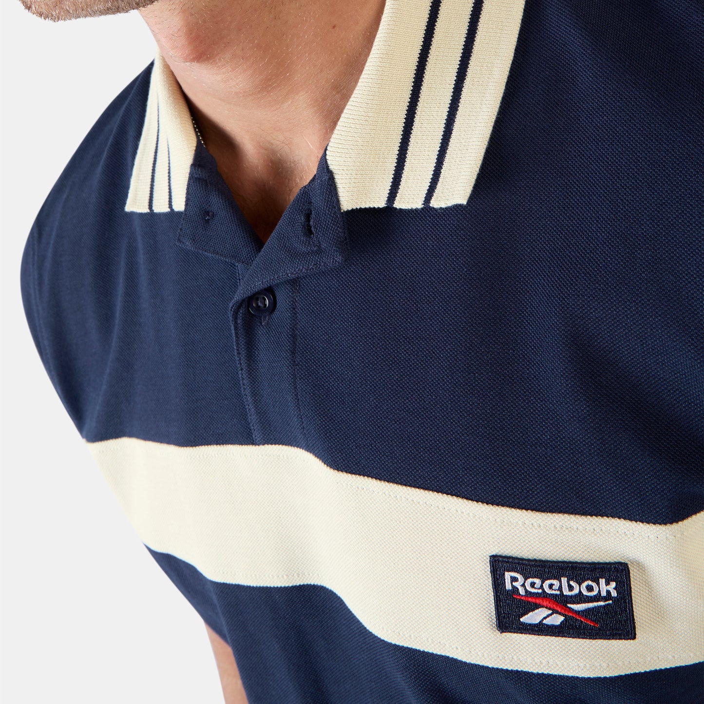 REEBOK APPAREL MEN Heritage Paneled Piqué Polo Shirt VECTOR NAVY/LINEN