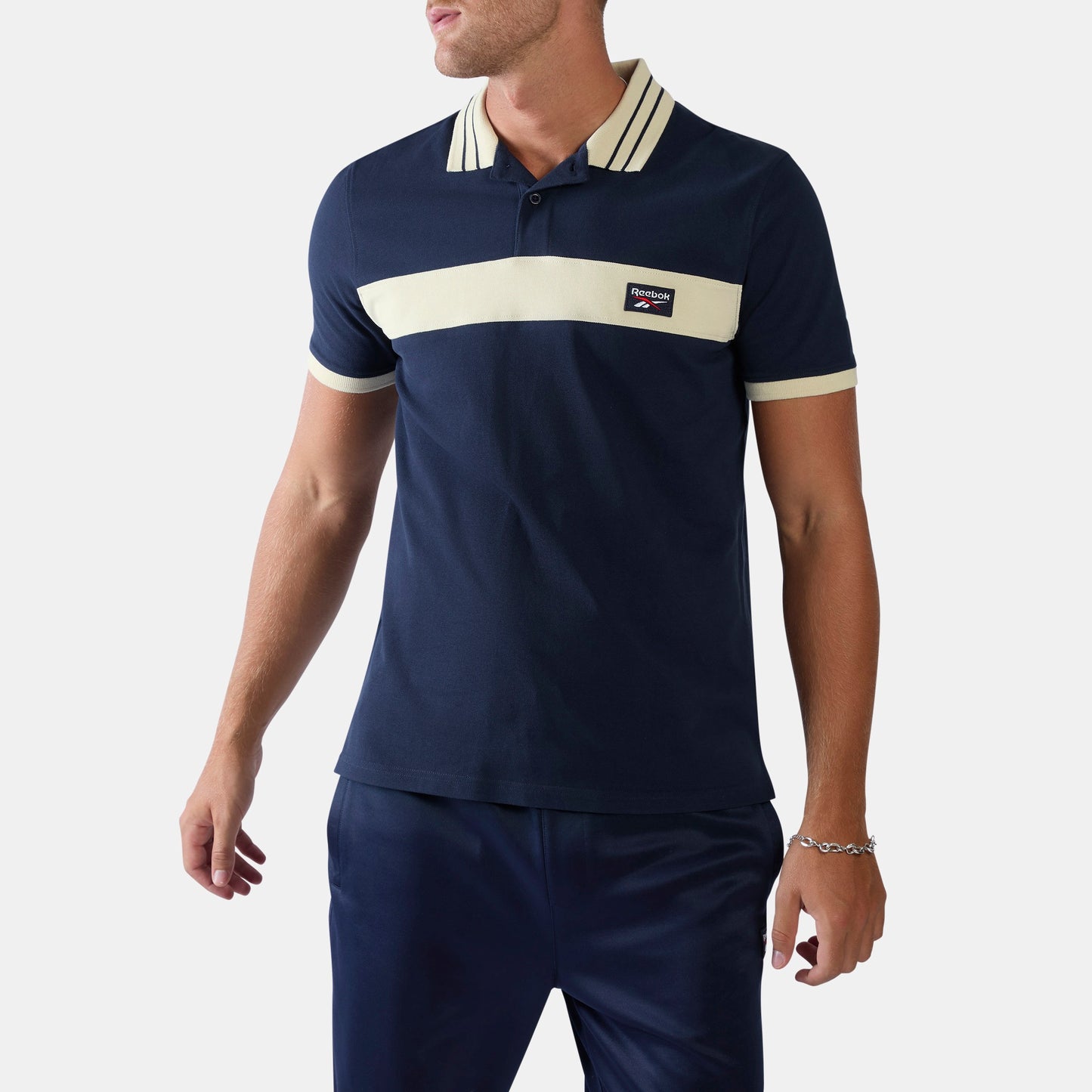 REEBOK APPAREL MEN Heritage Paneled Piqué Polo Shirt VECTOR NAVY/LINEN