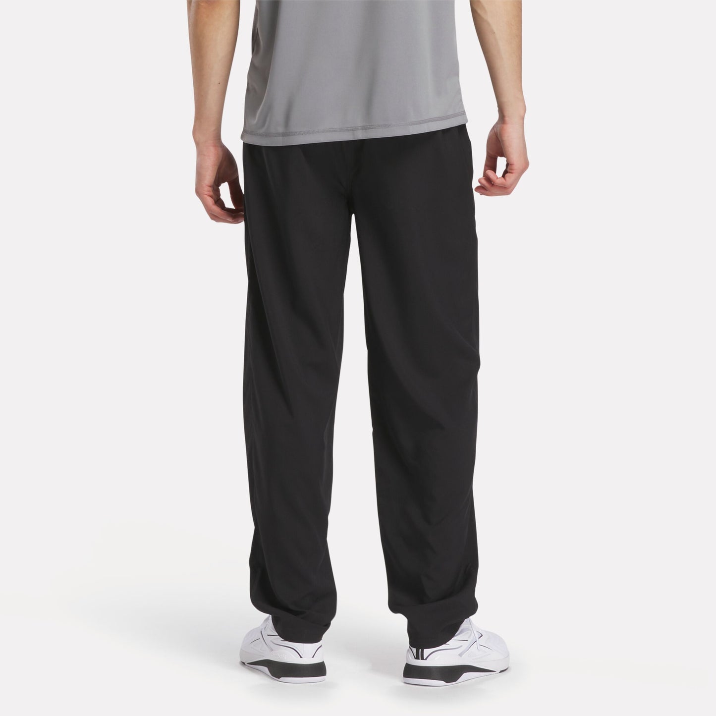 REEBOK APPAREL MEN Reebok x F45 Training Woven Pants VECTOR NAVY