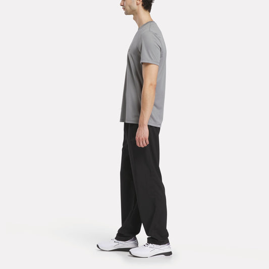 REEBOK APPAREL MEN Reebok x F45 Training Woven Pants VECTOR NAVY