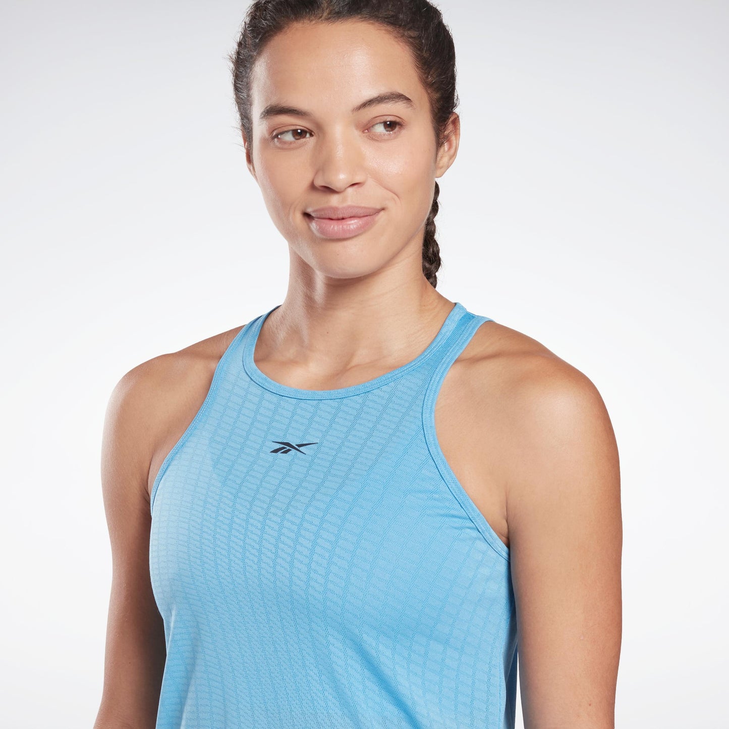 Reebok Apparel Women United By Fitness Perforated Tank Top ESSBLU