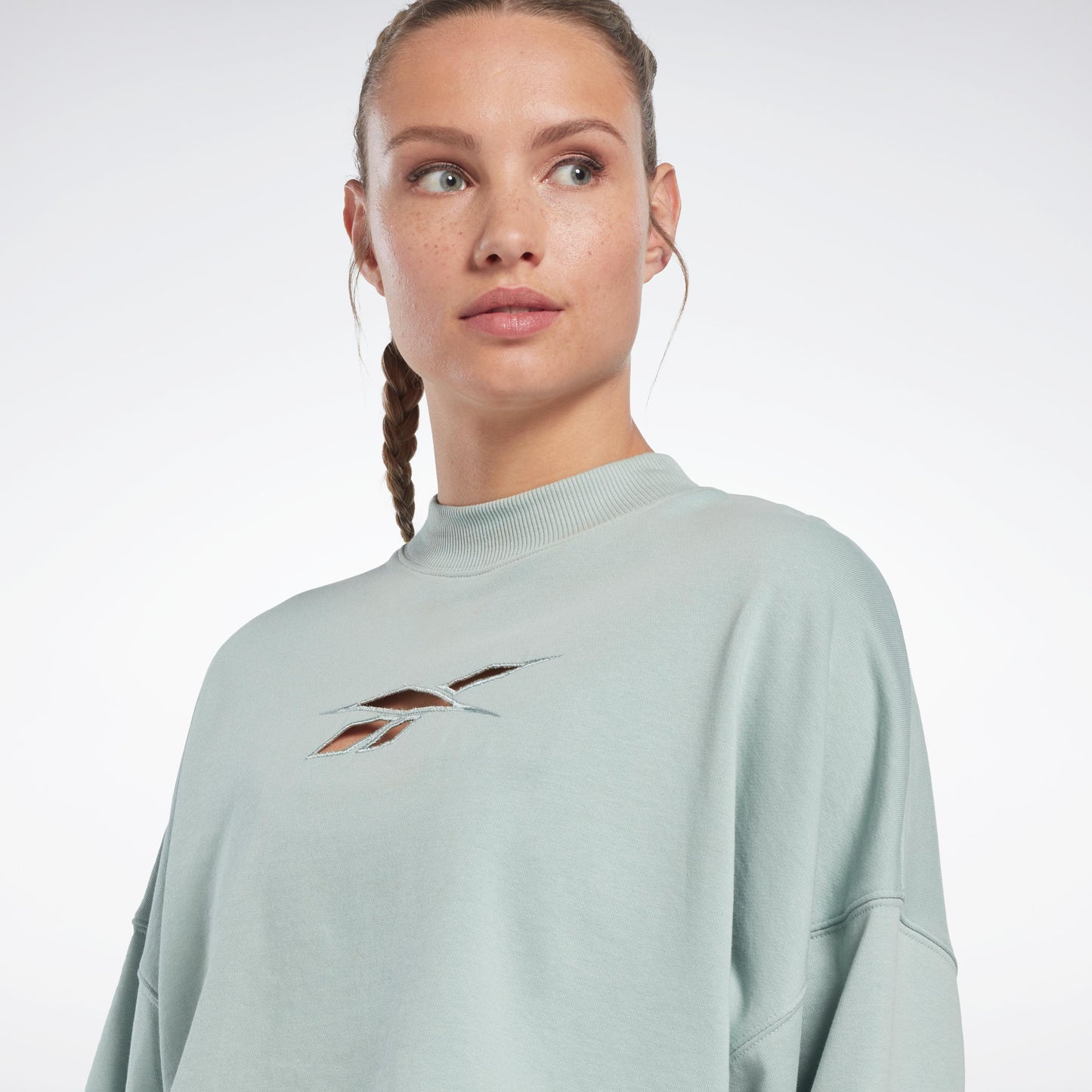 Reebok Apparel Women Studio Vector Knit Crew Sweatshirt SEAGRY