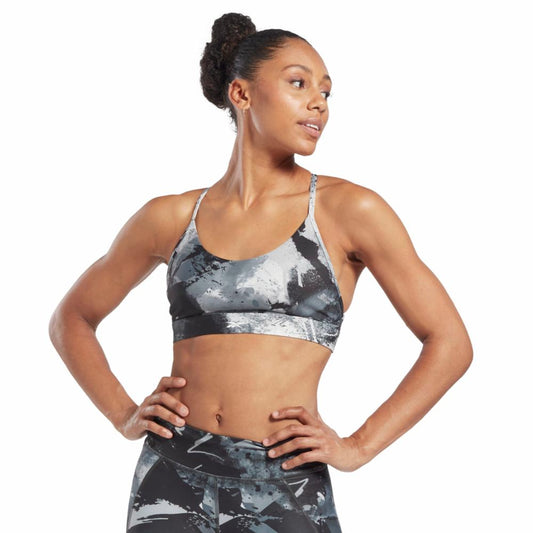 Reebok Apparel Women Lux Strappy All Over Print Bold Bra BLACK