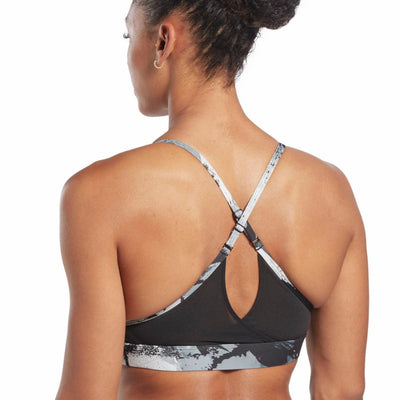 Reebok Apparel Women Lux Strappy All Over Print Bold Bra BLACK