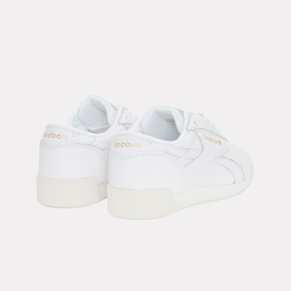 REEBOK FOOTWEAR WOMEN Freestyle Lo Shoes CHALK/GOLDMETALLIC/GUM