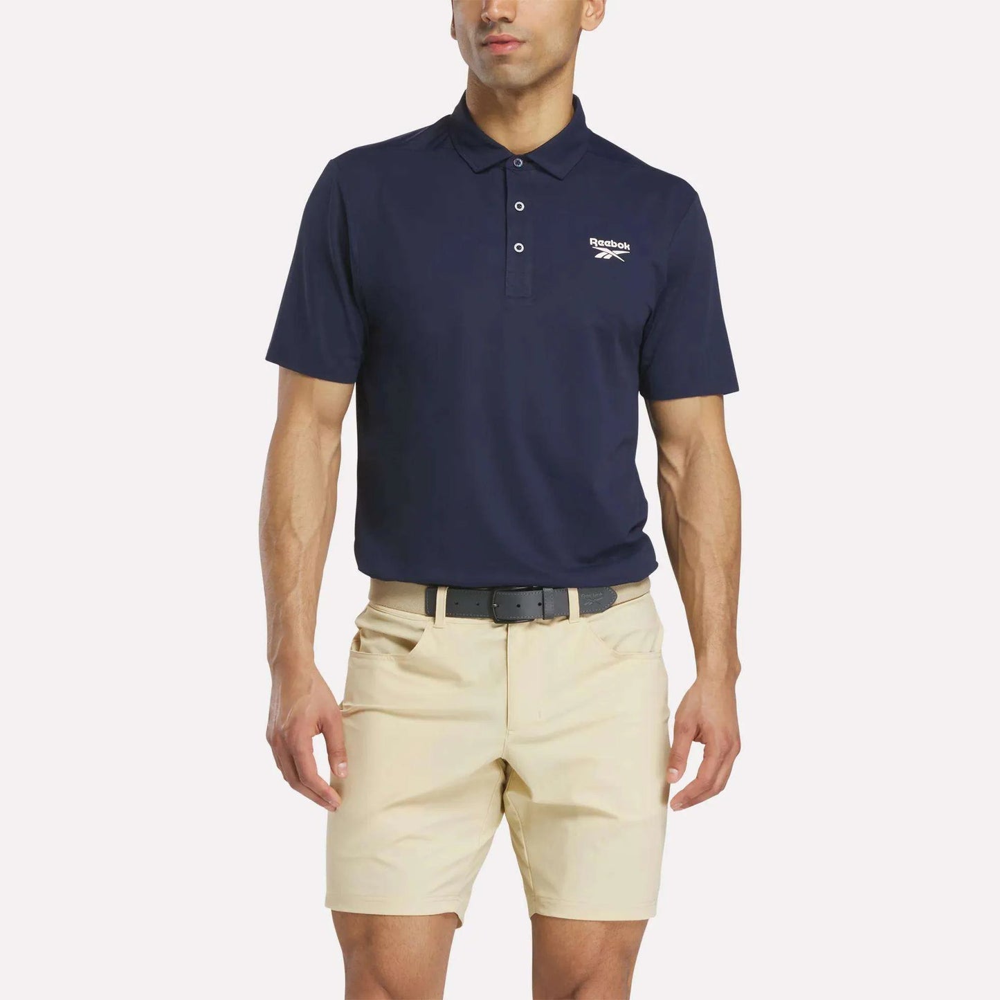 REEBOK APPAREL MEN Golf Pique Short Sleeve Polo VECTOR NAVY