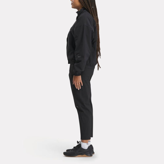 Reebok Training woven tech sweatpants in black - ShopStyle Activewear Pants