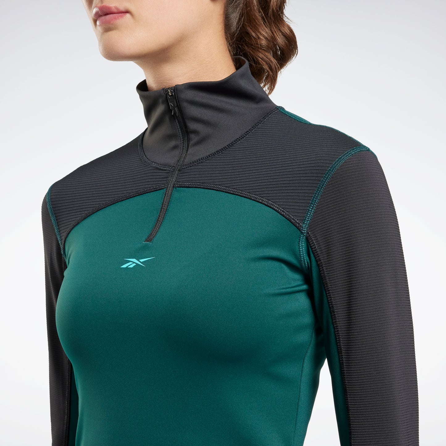 Reebok Apparel Women Tech Style Thermowarm+Graphene Quarter-Zip Sweatshirt Forgrn