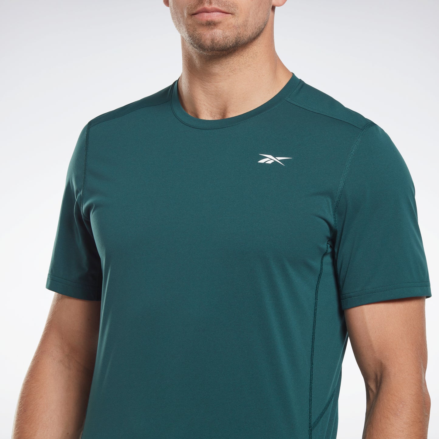 Reebok Apparel Men United By Fitness Movesoft T-Shirt Forest Green