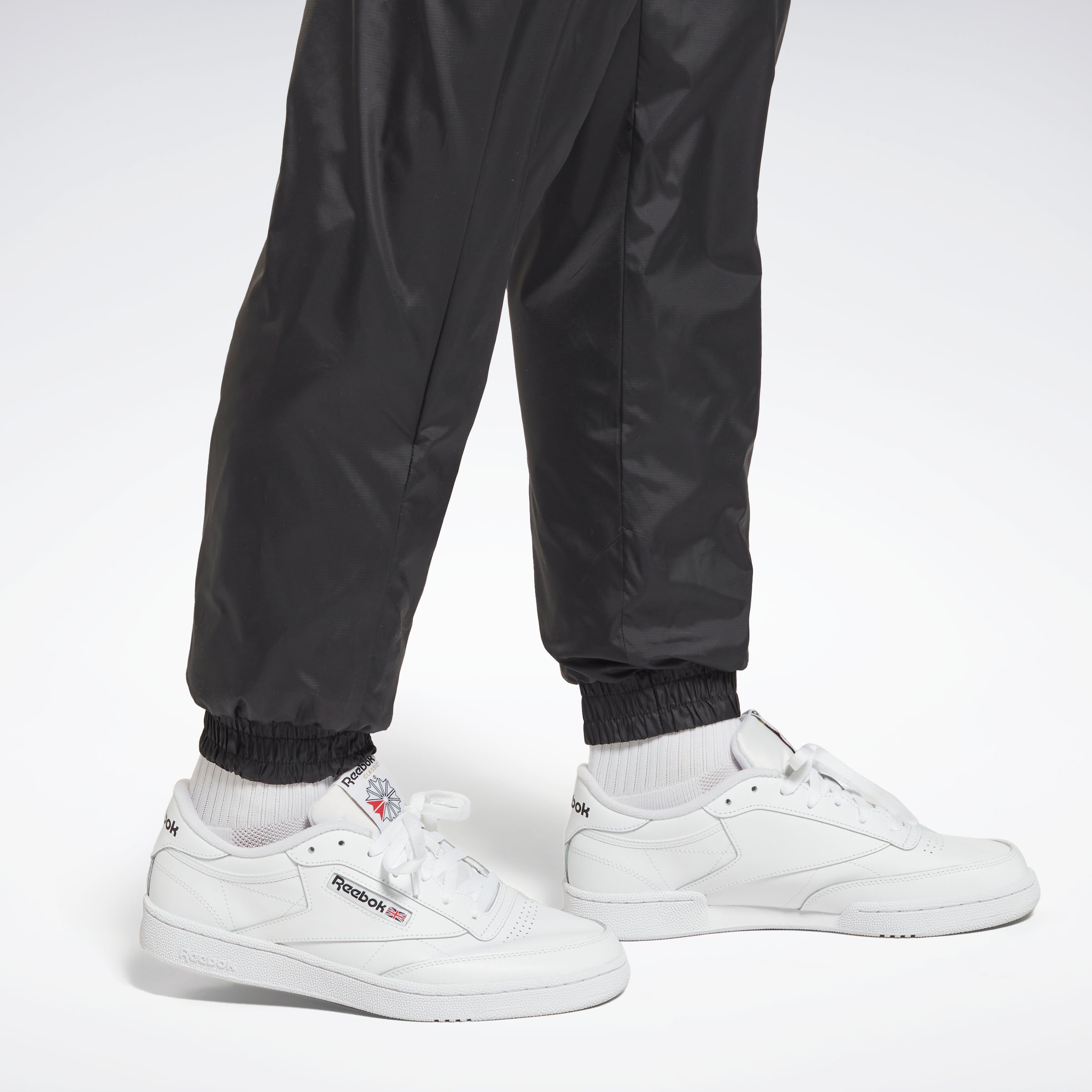 Reebok Apparel Men Outerwear Fleece-Lined Trousers Black – Reebok