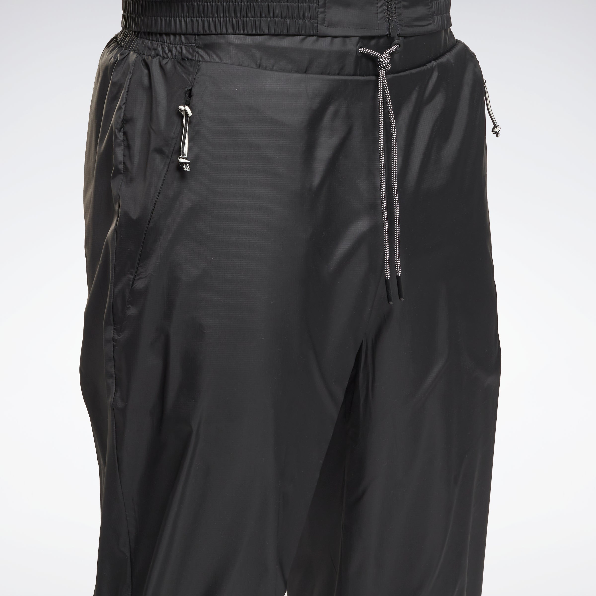 Reebok Apparel Men Outerwear Fleece-Lined Trousers Black – Reebok