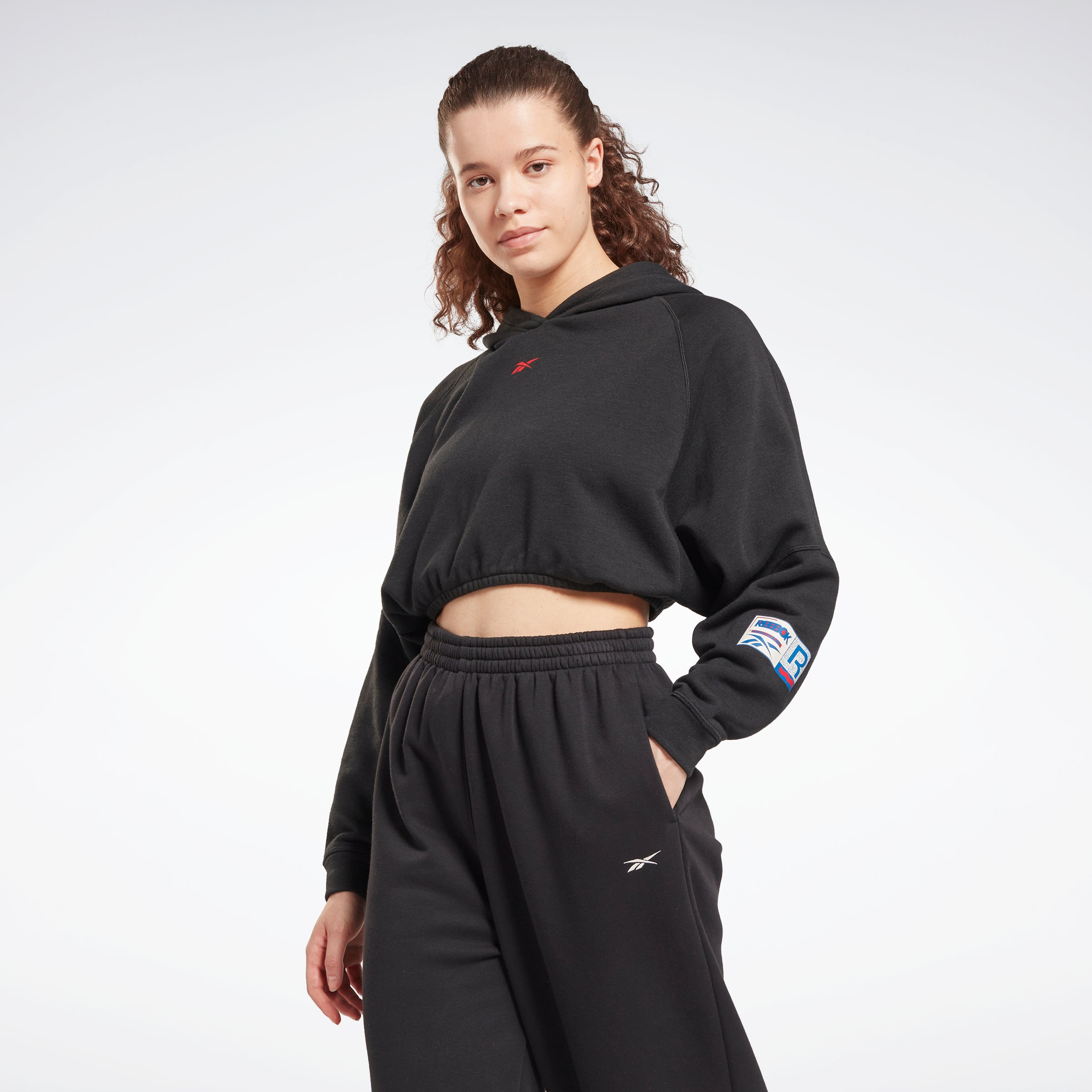 Reebok Apparel Women Tech Style Hooded Crop Sweatshirt Black