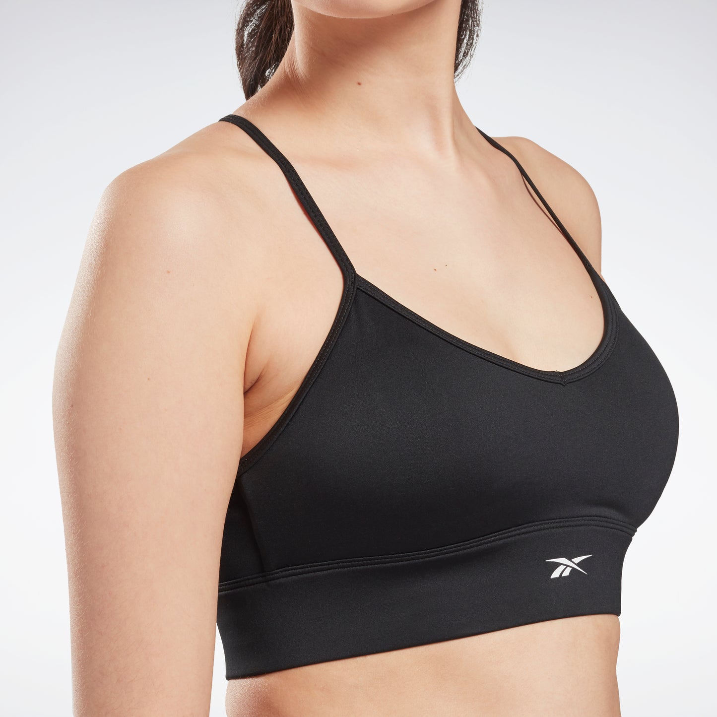 Reebok Training Techstyle blocked mid-support sports bra in gray