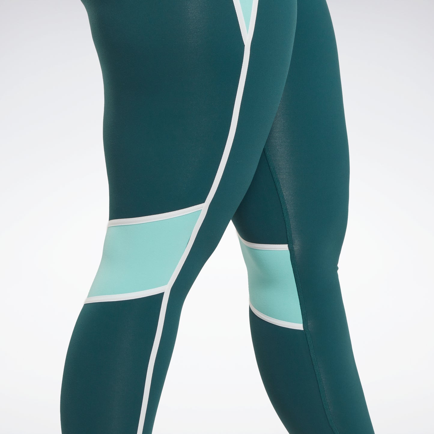 Reebok Apparel Women Lux High-Waisted Colorblock Leggings (Plus Size) Forgrn